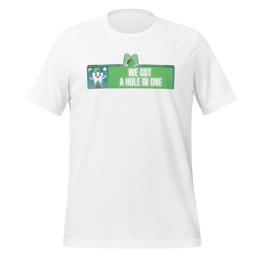 Cute dentist t-shirt showcasing an adorable tooth character in golf attire, joyfully celebrating a ‘hole in one’ achievement, perfect for dentist and dental professionals seeking unique and thematic dental apparel. White color front view.